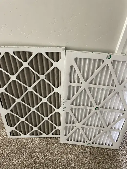 Clean and dirty HVAC filters side by side